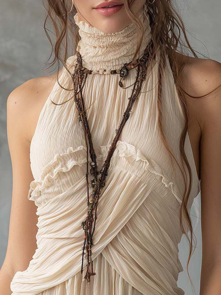 Top boho romantico in chiffon plissettato con collo all’americana