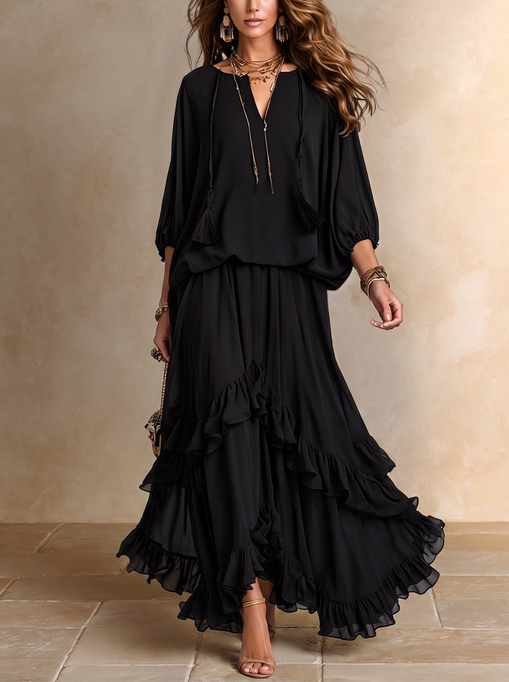 Elvira | Completo con top nero in chiffon con scollo a V e frange abbinato a gonna a balze a strati
