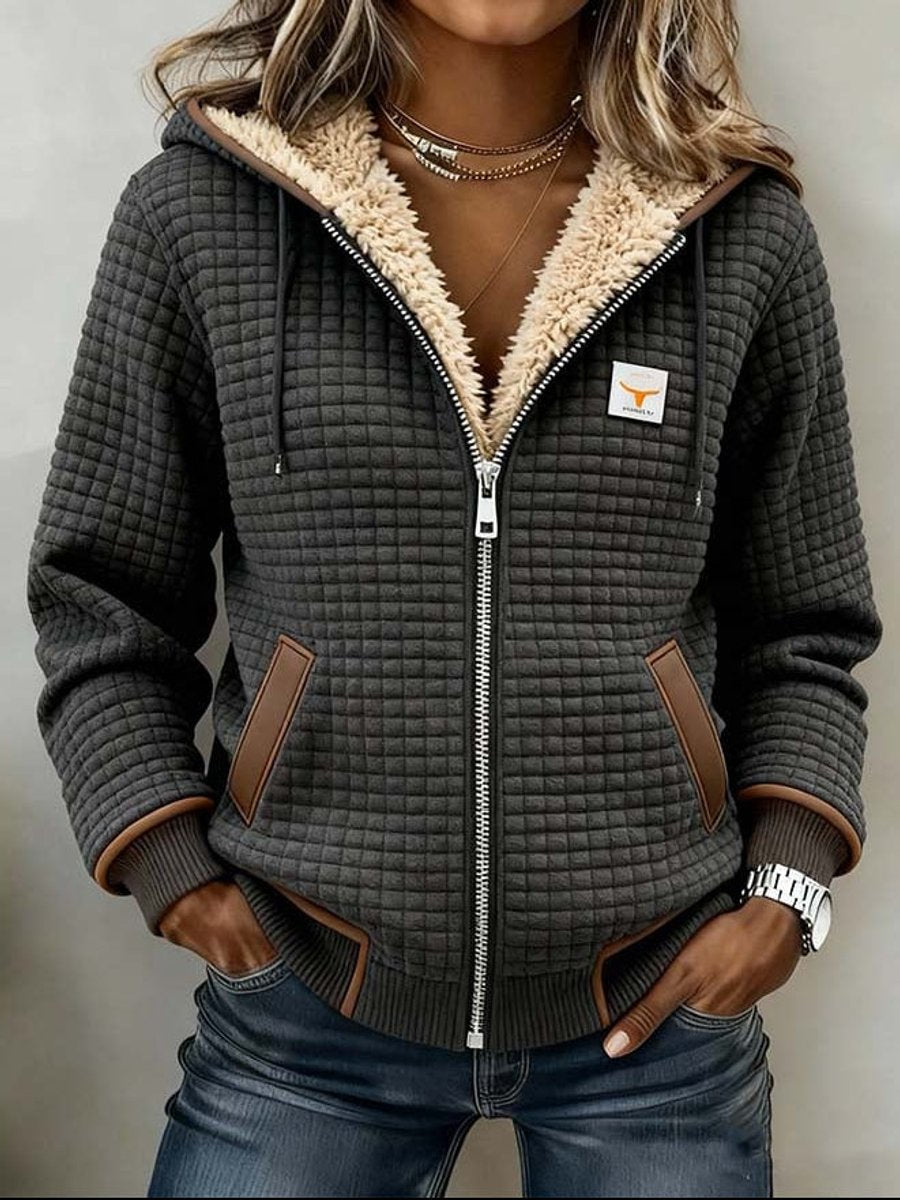 Sandra | Giacca trapuntata con cappuccio, fodera in sherpa e chiusura con zip