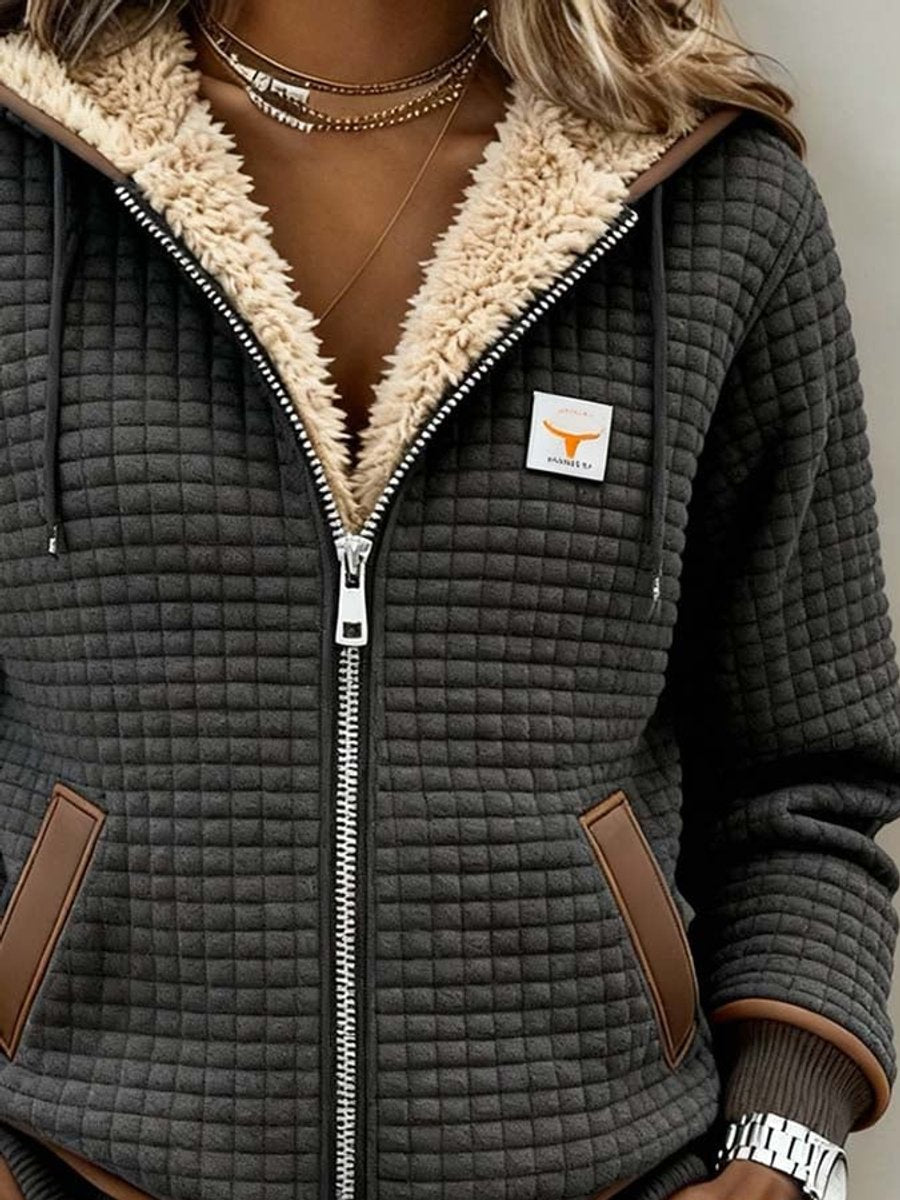 Sandra | Giacca trapuntata con cappuccio, fodera in sherpa e chiusura con zip